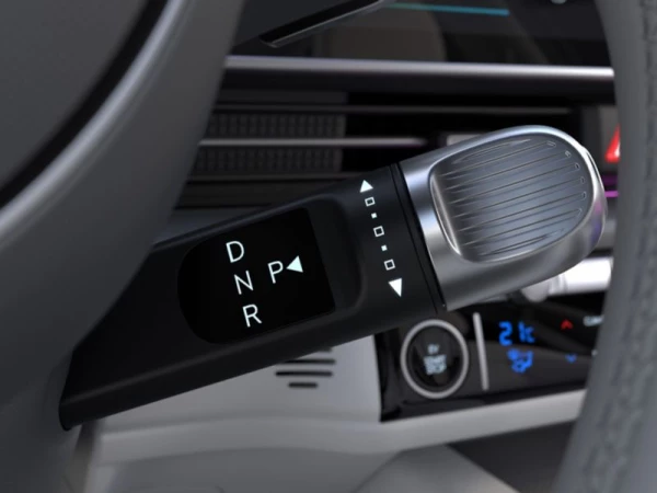 Transmission à commande électrique derrière le volant.
